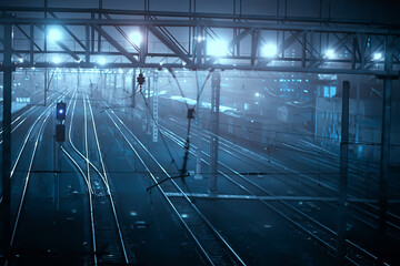 railway tracks night landscape at the railway station fog autumn