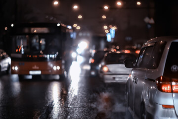 Fototapeta premium traffic of cars in the night city, view from the car, lights abstract auto background