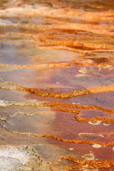 Vibrantly colored, abstract textural geological formations 