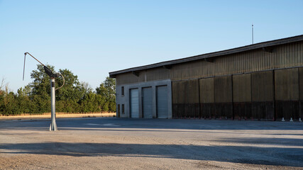 Fototapeta na wymiar Warehouse and grain storage silo