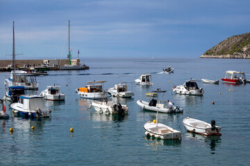 Fototapeta na wymiar Panorama of Komiza, settlement and fishing port on island Vis on Adriatic sea in Croatia