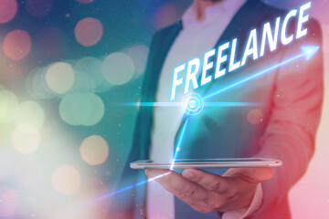 Word writing text Freelance. Business photo showcasing an individual who pursues a profession...