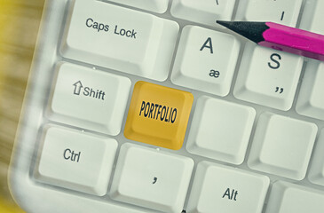 Handwriting text writing Portfolio. Conceptual photo securities held by an investor, paper held by...