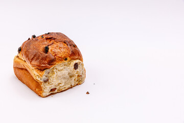 bread with raisins on white background