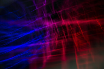 Abstract blurred technology grid lights red and blue overlay