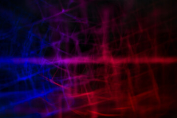 Abstract blurred technology grid lights red and blue overlay