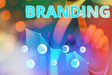 Word writing text Branding. Business photo showcasing the promoting of a product or service of a...