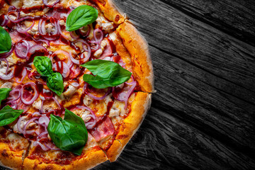 Pizza with chicken and barbeque sauce . Italian pizza on wooden table background