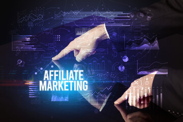 Businessman touching huge screen with AFFILIATE MARKETING inscription, cyber business concept