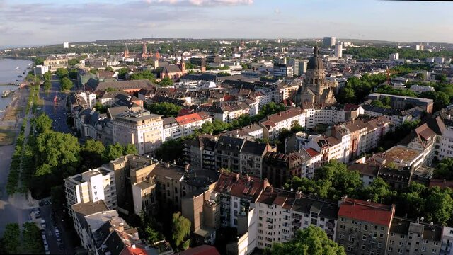 Aerial shot of city part Neustadt in Mainz showing Christus Kirche and Dom and its old bridge in the back