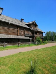 Saint-Petersburg,Russia-07.18.2020: The wooden ancient russian buildings.the Bogoslovka Estate park ensemble in Saint-Petersburg.