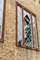 Open window, diamond shape, London, portrait orientation. 