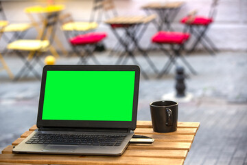 front viewe laptop on wooden table