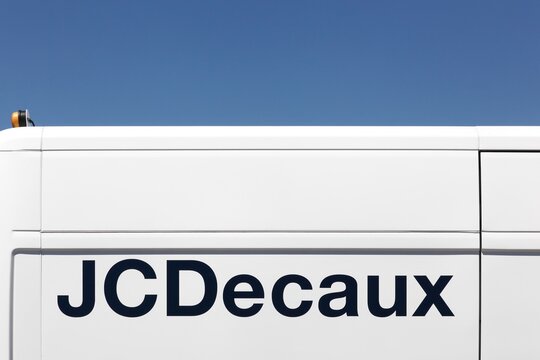 Decines, France - June 13, 2019: JCDecaux is a multinational corporation based in France, known for its bus-stop advertising systems, billboards, public bicycle rental systems, and street furniture