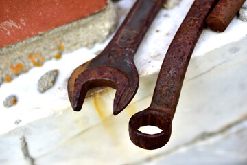 Iron and rusty keys and garage door bracket