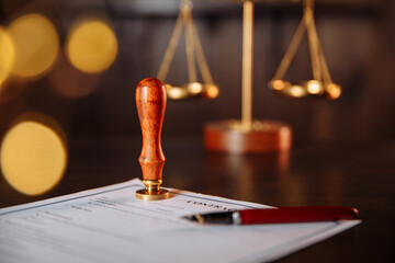 Notary's public pen and stamp on a contract. Notary public tools.
