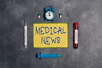 Handwriting text Medical News. Conceptual photo report or noteworthy information on a medical...