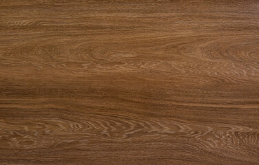 Polished wood surface. The background of polished wood texture.