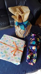 close up of a suitcase. nicely wrapped presents for birthday