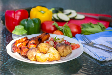 grilled sausage with baked potatoes