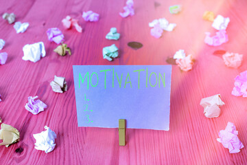 Writing note showing Motivation. Business concept for the general desire or willingness of someone to do something Colored crumpled rectangle shaped reminder paper light blue background - obrazy, fototapety, plakaty