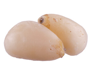 pair of raw pine nuts isolated on white background, closeup, detailed texture of walnut skin, macro...