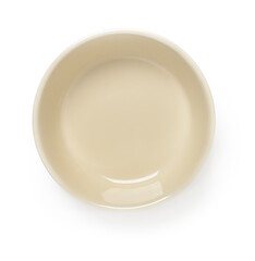 Empty beige ceramic bowl or ramekin isolated on a white background. Empty crockery for food design. Clay, ceramics or porcelain tableware.