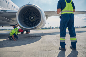 Ground crew carrying out a post-flight examination