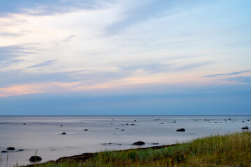 Fototapeta na wymiar Grass with ocean sunset background, Sweden