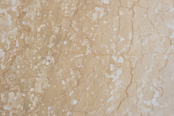 Brown and beige granite texture. Stone background. Polished natural granite slab. 
