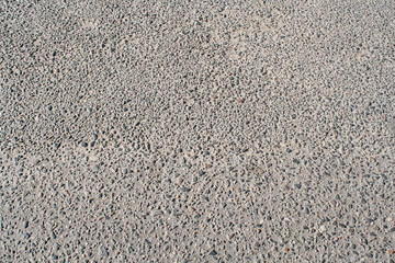 Asphalt texture, road texture, stone background. Tarpaulin texture, top view.