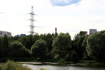 landscape of a city Park with a pond
