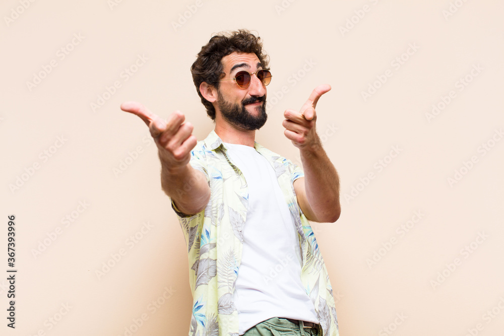 Wall mural young cool bearded man dancing. holidays concept