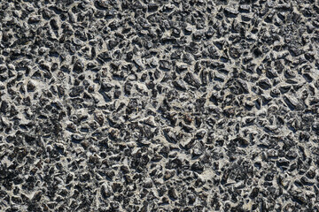 bitumen on the asphalt road, which melts due to the heat in the summer, melted pitch and asphalt road, hot and melted asphalt roads,