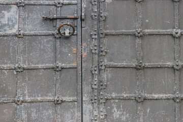 Close-up of the old iron black door