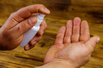 Man hands using hand sanitizer. Concept of coronavirus prevention