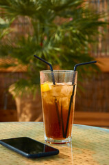 Cocktails on the beach. Bright cold drinks on the beach in summer. Summer vacation and travel concept.