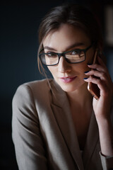 Portraiture of businesswomen with glasses from a mobile phone