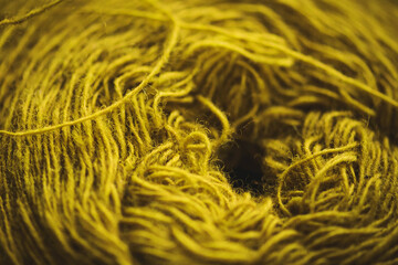 close-up of beautiful golden sheep wool threads