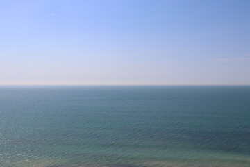 beautiful seascape, ocean horizon on a background of blue sky