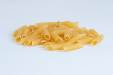 Italian pasta (macaroni) isolated on white background. Space for text.