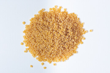 Italian pasta (macaroni) isolated on white background. Space for text.