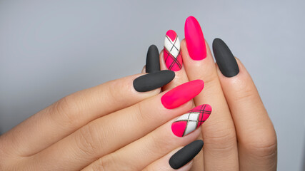  Manicure nail paint . beautiful female hand with colorful nail art design manicure