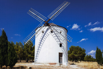 Fototapeta na wymiar Traditional windmill of La Mancha, in Spain, protagonist of the famous novel Don Quixote.