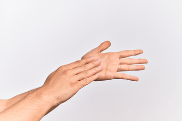 Hand of caucasian young man showing fingers over isolated white background touching palms gentle, delicate beauty pose