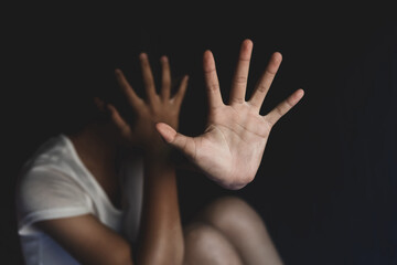 Fototapeta premium Stop violence against Women,sexual abuse,The concept of sexual harassment against women and rape,