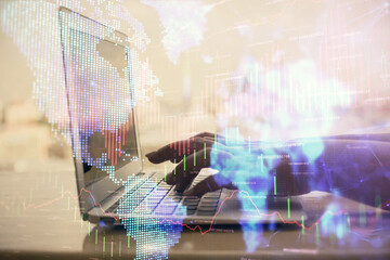 Double exposure of woman hands typing on computer and forex chart hologram drawing. Stock market invest concept.