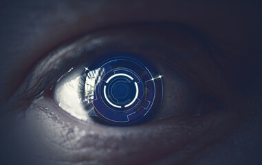 close-up human eye and technological icons
