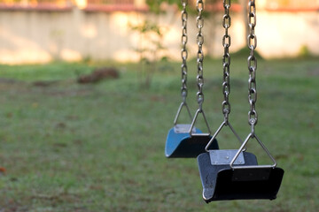 Empty swingseat at the playground