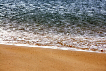 Waves on the sand beach.